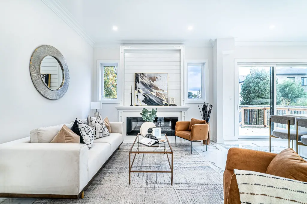 Warm contemporary living room staged by Astra