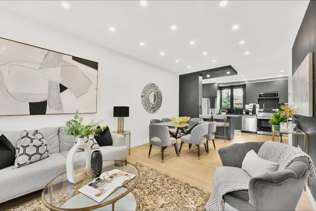 Polished grey living and dining room staged by Astra